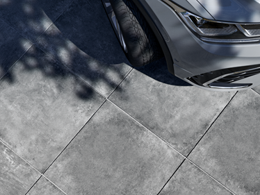 Bovenaanzicht van Vulkano 3cm betonlook panelen met auto en schaduw uitsparingen